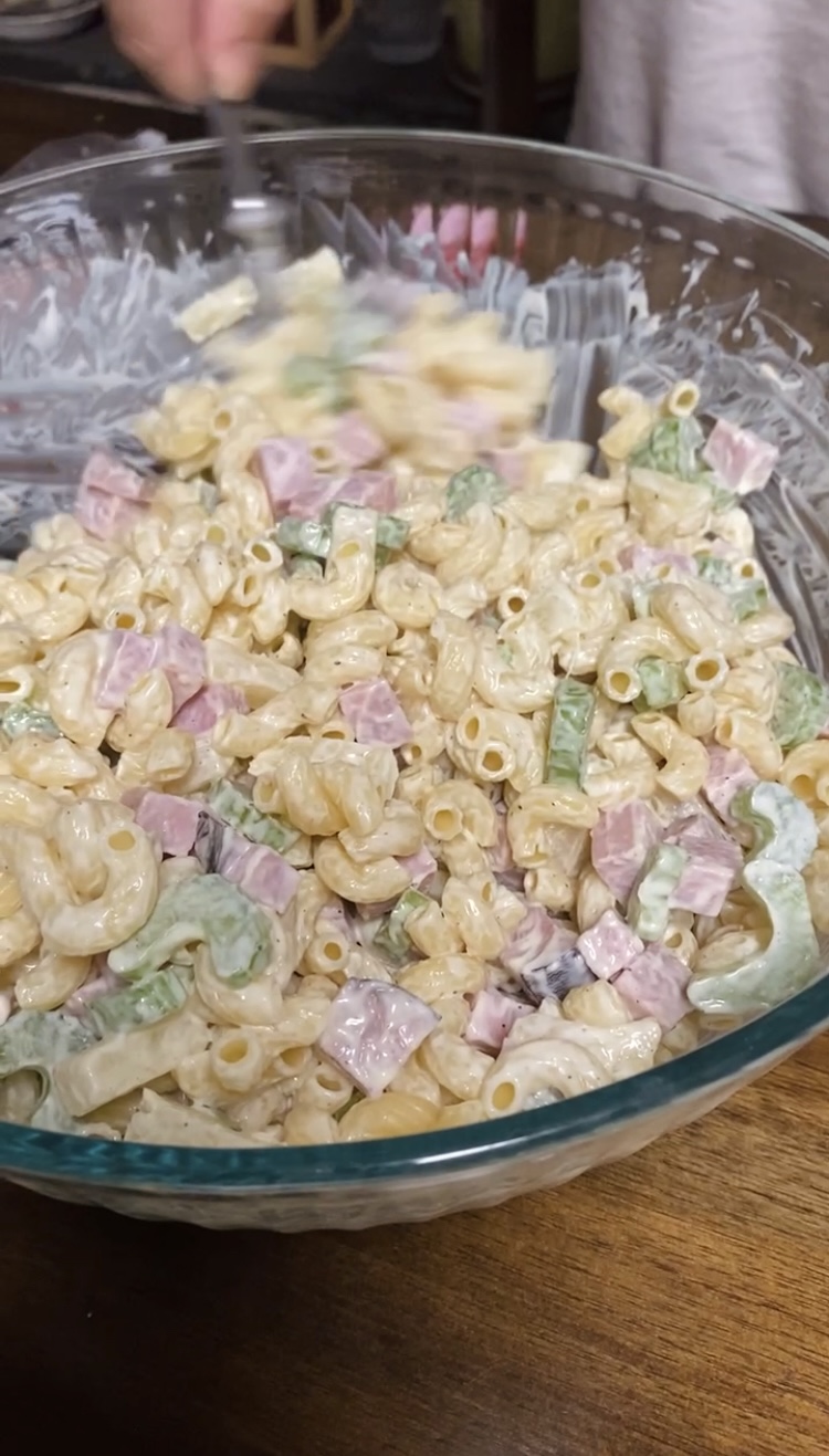 macaroni salad recipe mixing together ham celery and pineapples